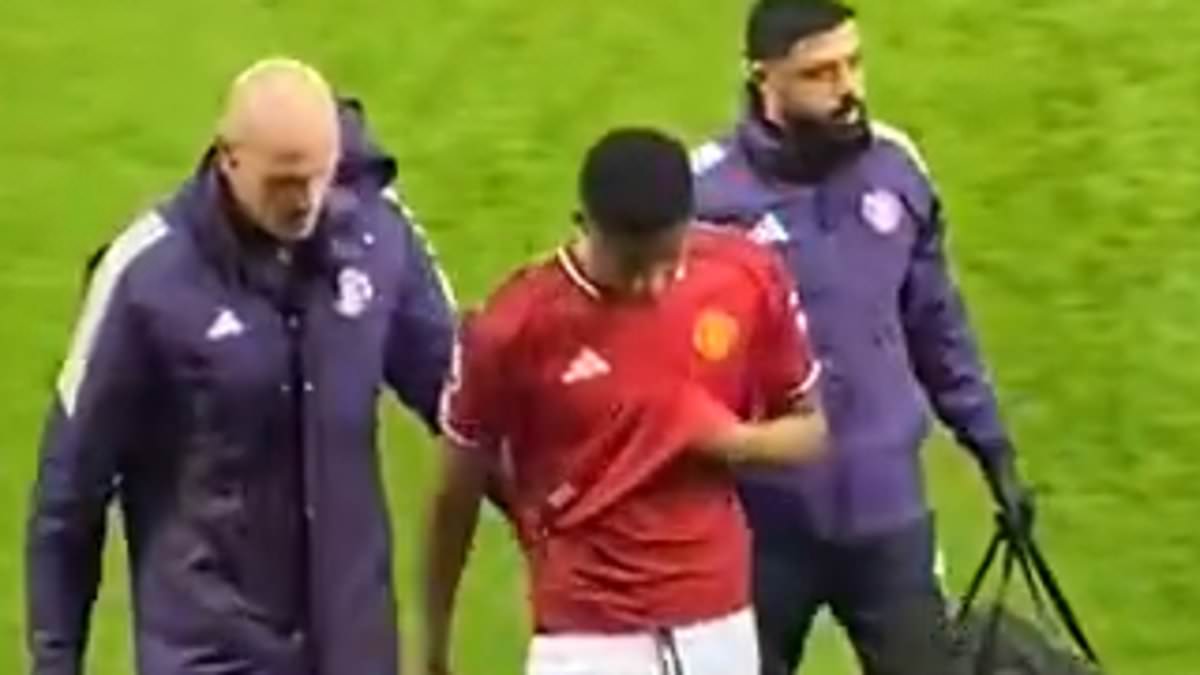 Man United star suffers worrying injury after being struck by the ball just SECONDS into Under 21s match as Michael Carrick watches on
