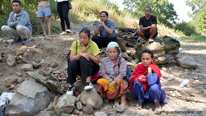 Around the world, people desperately search for news of missing loved ones after Nepal-China floods