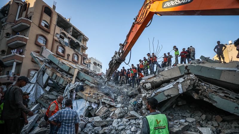 Gaza building collapse kills at least 20, dozens more trapped under rubble